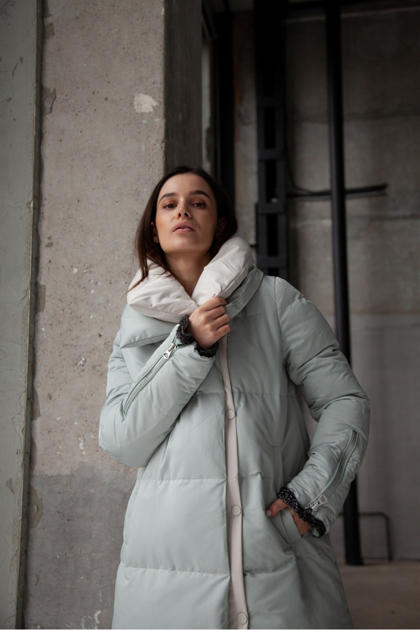 Stylish down jacket in mint color with natural filler