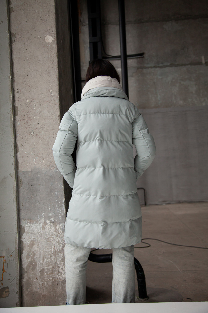 Stylish down jacket in mint color with natural filler