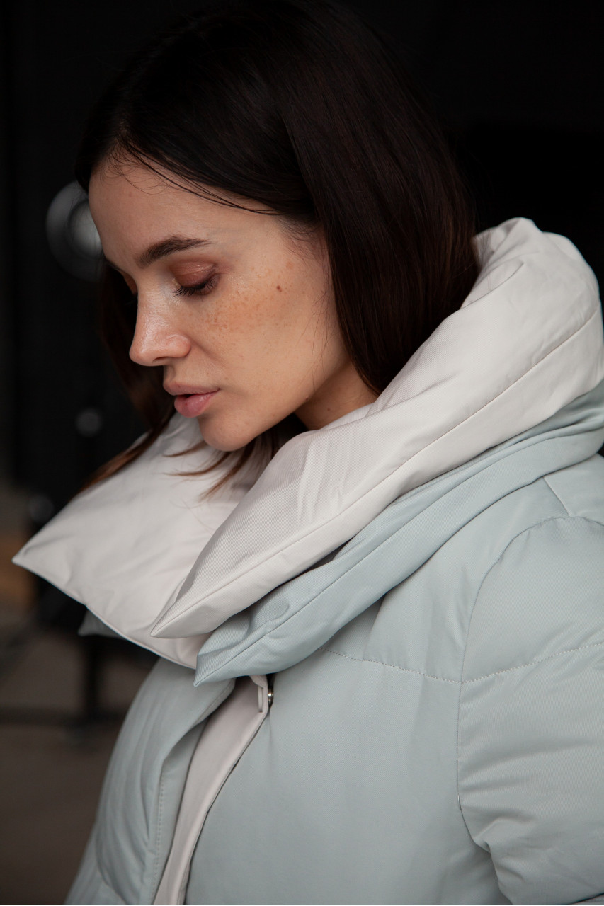 Stylish down jacket in mint color with natural filler