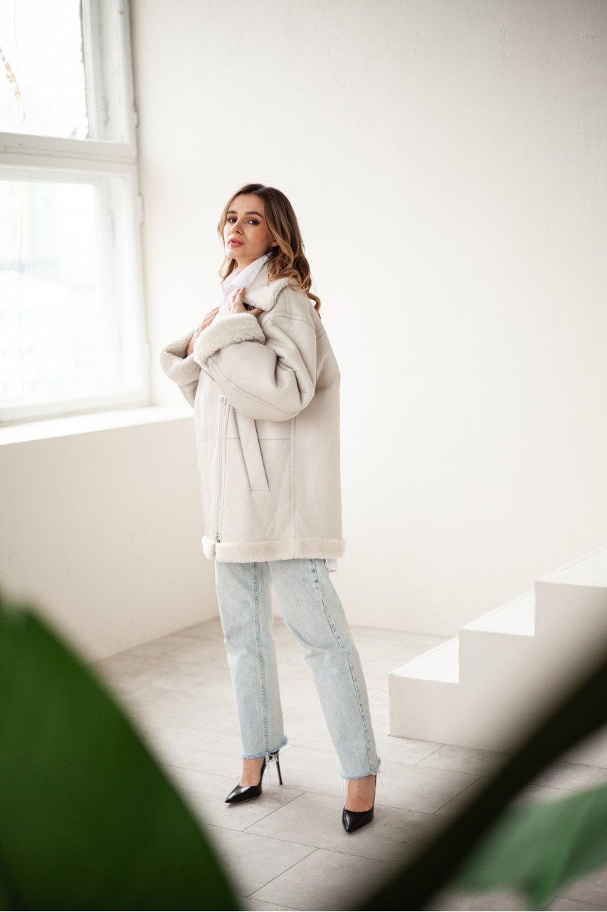 White women's sheepskin coat made of natural sheepskin