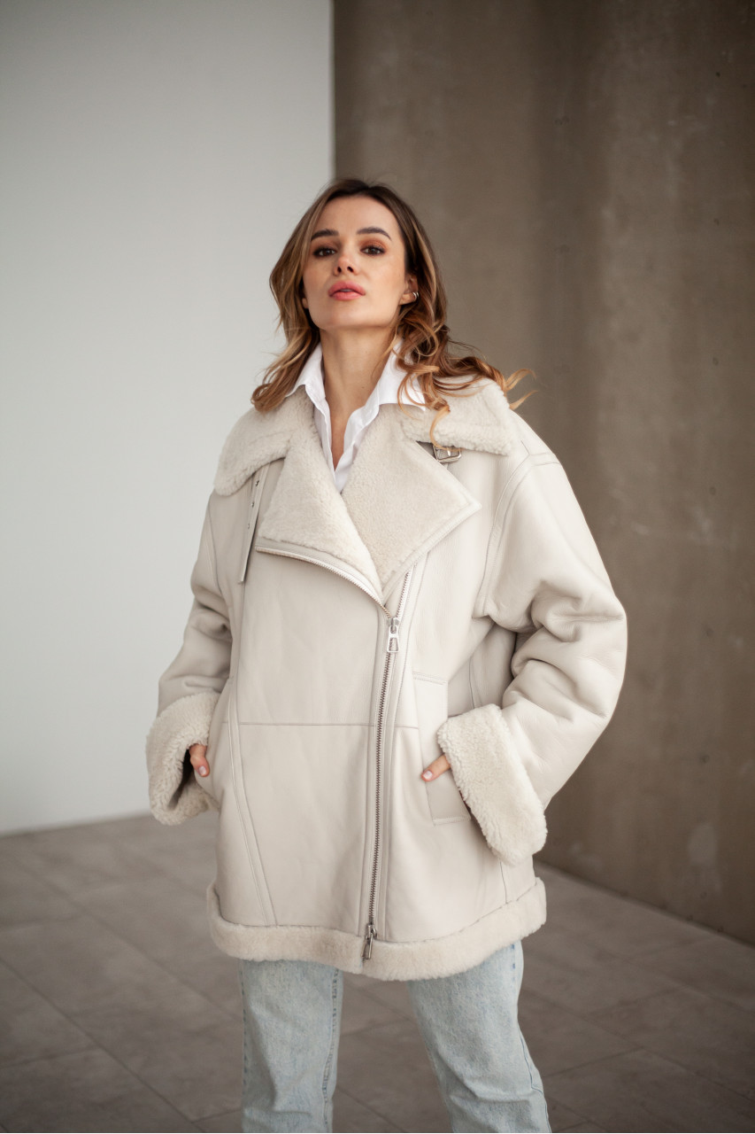 White women's sheepskin coat made of natural sheepskin