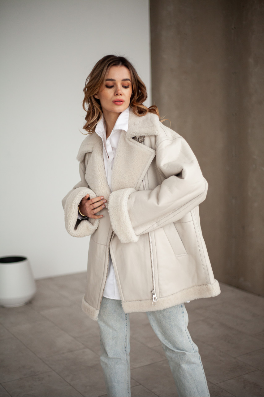 White women's sheepskin coat made of natural sheepskin