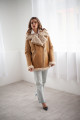 Women's sheepskin coat made of natural straw-colored sheepskin in VINTAGE style