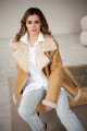 Women's sheepskin coat made of natural straw-colored sheepskin in VINTAGE style
