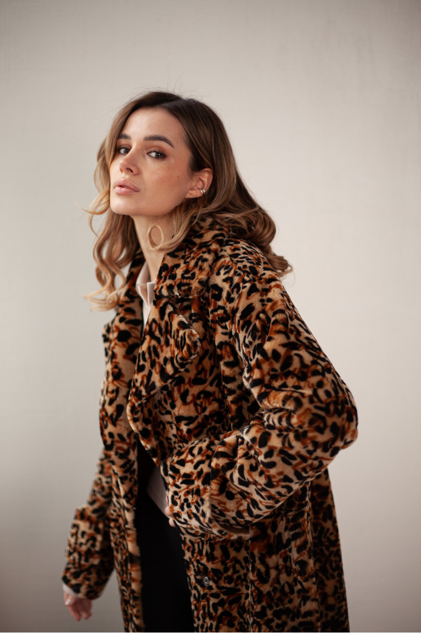 Long women's sheepskin coat made of natural sheepskin with a leopard print