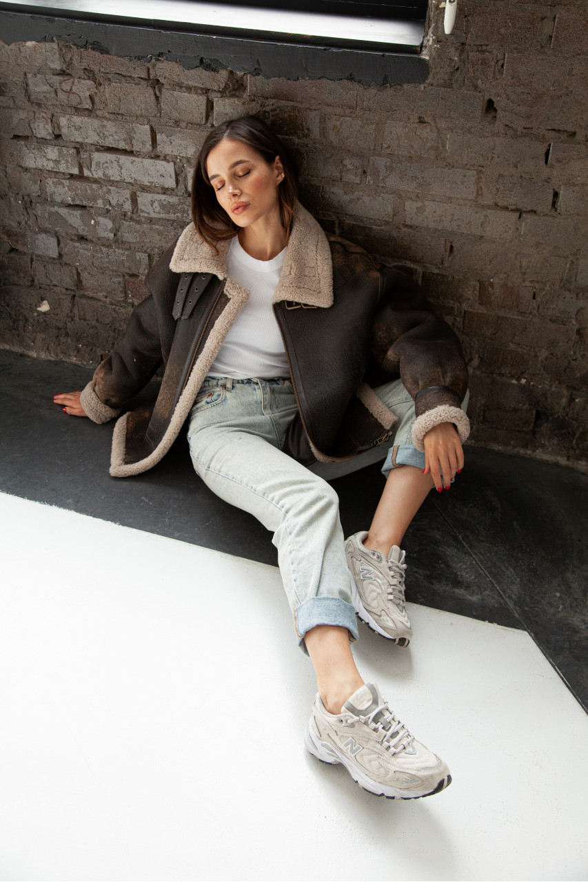 Stylish women's sheepskin coat made of natural sheepskin in VINTAGE style