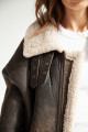 Stylish women's sheepskin coat made of natural sheepskin in VINTAGE style