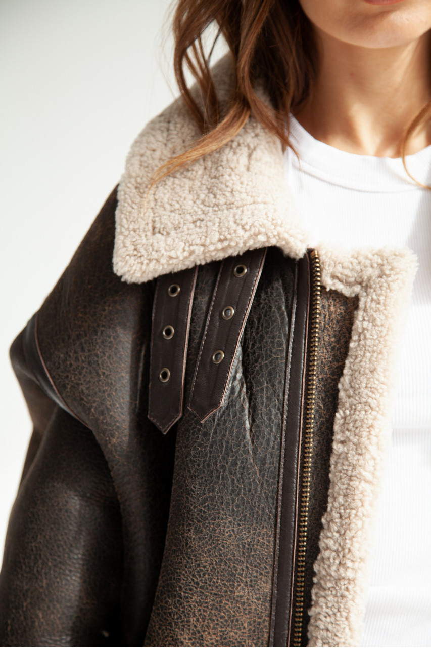 Stylish women's sheepskin coat made of natural sheepskin in VINTAGE style