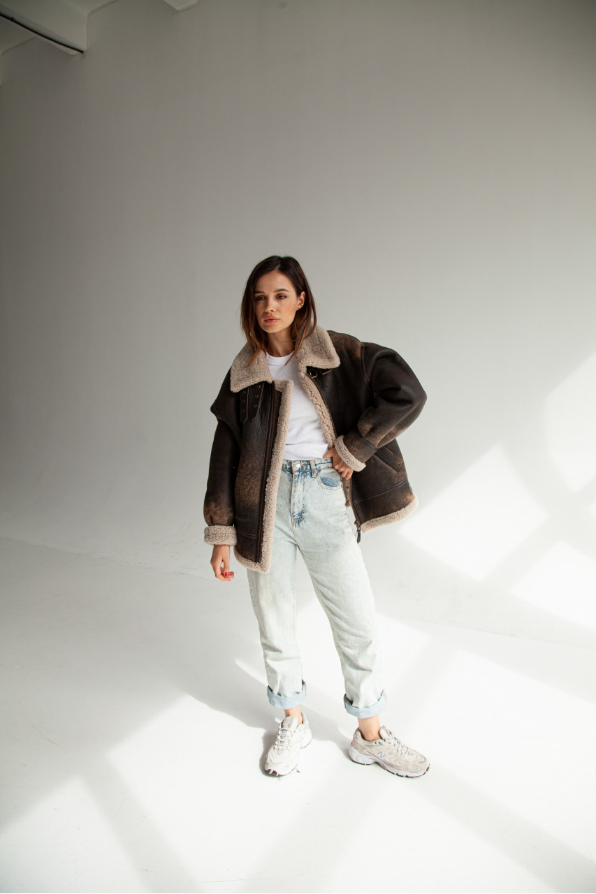 Stylish women's sheepskin coat made of natural sheepskin in VINTAGE style