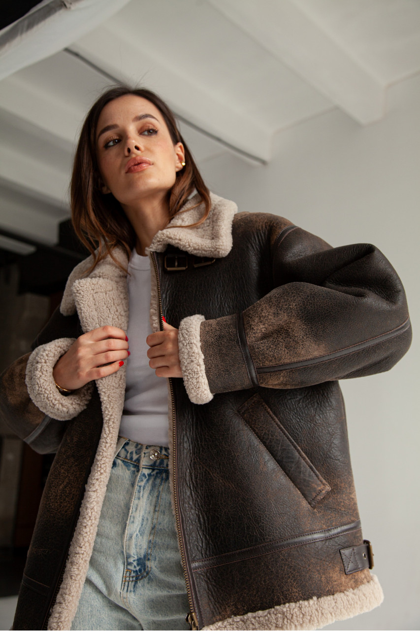 Stylish women's sheepskin coat made of natural sheepskin in VINTAGE style