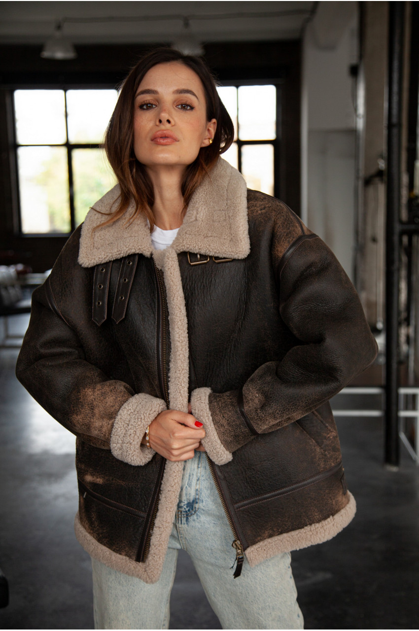 Stylish women's sheepskin coat made of natural sheepskin in VINTAGE style