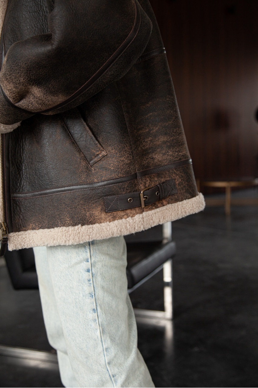 Stylish women's sheepskin coat made of natural sheepskin in VINTAGE style