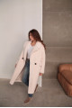 Women's sheepskin coat made of natural pink sheepskin wool
