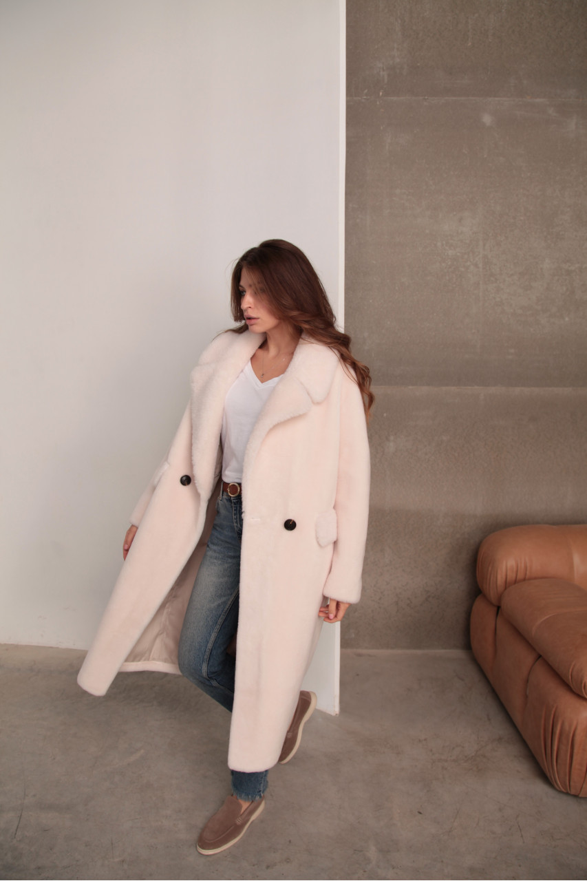 Women's sheepskin coat made of natural pink sheepskin wool