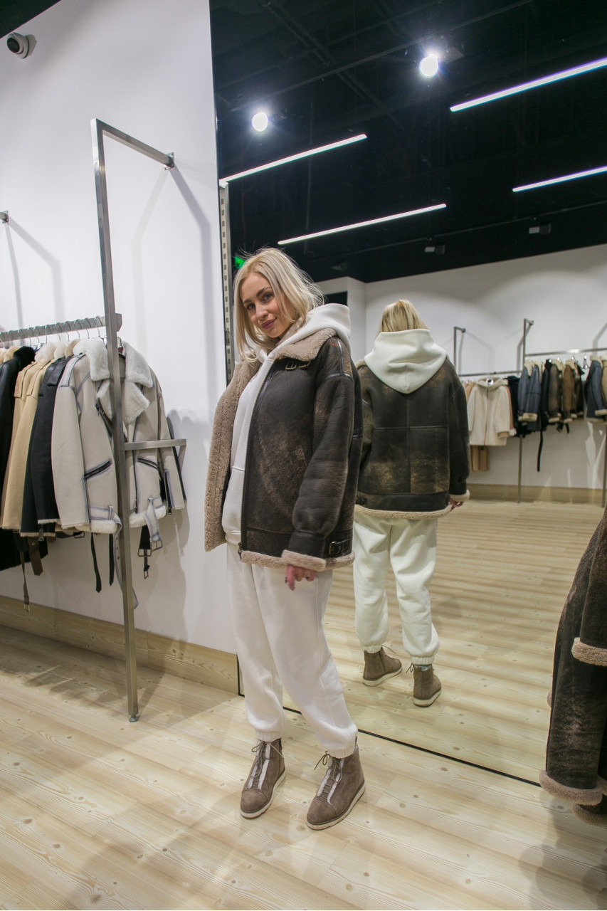 Stylish women's sheepskin coat made of natural sheepskin in VINTAGE style