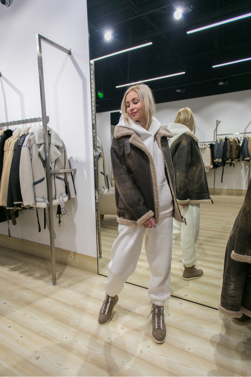 Stylish women's sheepskin coat made of natural sheepskin in VINTAGE style