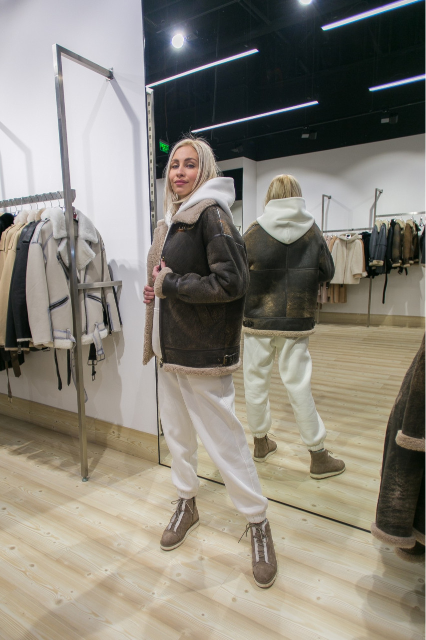Stylish women's sheepskin coat made of natural sheepskin in VINTAGE style
