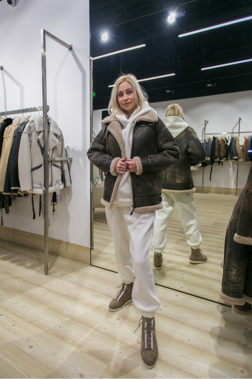 Stylish women's sheepskin coat made of natural sheepskin in VINTAGE style